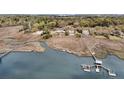 Picturesque waterfront homes with private docks, offering direct access to the tranquil waters at 4701 Apple St, North Charleston, SC 29405