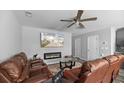 Modern living room with stylish fireplace and mounted TV above, creating a cozy atmosphere at 9727 Transplanter Cir, Ladson, SC 29456