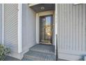 Inviting home entrance featuring a black-framed glass front door at 117 Lewisfield Dr, North Charleston, SC 29418