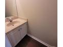 Cozy bathroom with a vanity, granite countertop, and classic white cabinetry at 1391 Center Lake Dr, Mount Pleasant, SC 29464