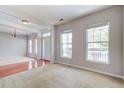 Bright living room featuring hardwood and carpet floors with natural light and modern accents at 2019 Azalee Ln, Summerville, SC 29483