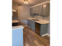 Updated kitchen with stainless steel appliances and ample countertop space at 203 Oakmont Ave # B, Ladson, SC 29456