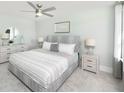 Bright bedroom features a comfortable bed, neutral color palette, and natural light from the window at 267 Garden Gate Way, Summerville, SC 29486