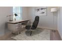 Home office space with a contemporary desk, comfortable chair, and ample natural light at 700 Pisces Ln, Summerville, SC 29486