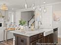 Open kitchen with granite counters, a farmhouse sink, stainless steel appliances, and view of staircase at 1018 House Finch Ave # Cc3-22-8, Ravenel, SC 29470