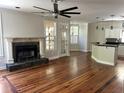 Spacious living room featuring hardwood floors, a fireplace, and an open floor plan at 1026 Stono River Dr, Charleston, SC 29412