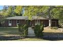 Lovely brick home with manicured shrubs lining the walkway, enhancing its curb appeal at 1328 White Dr, Charleston, SC 29407