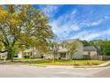 Traditional two-story home with a manicured lawn and classic architectural details at 1502 Thoroughbred Blvd, Johns Island, SC 29455