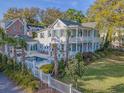 Stunning home with a pool and meticulously landscaped yard in a desirable neighborhood at 304 Bank St, Mount Pleasant, SC 29464
