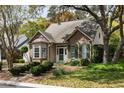 Charming brick home featuring a bay window and landscaped front yard at 956 Provincial Cir, Mount Pleasant, SC 29464