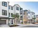 Charming street view showcasing modern townhomes with inviting curb appeal at 1213 Gatch Ct, Mount Pleasant, SC 29464