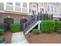 Welcoming townhouse entrance with well-maintained landscaping and direct access to the unit at 2519 Rutherford Way, Charleston, SC 29414