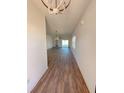 Bright, open-concept living space featuring hardwood floors and neutral paint at 434 Pender Woods Dr, Summerville, SC 29486