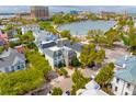 A scenic aerial view of a neighborhood with a lake and city skyline at 21 Rutledge Ave, Charleston, SC 29401