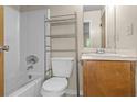 Full bathroom features a standard white tub, toilet, and vanity with storage at 7920 Parklane Ct # 608, North Charleston, SC 29418