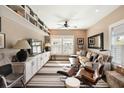 Comfortable living room with built-in bookshelves, stylish furniture, and natural light at 1012 Ashley Ave, Charleston, SC 29403