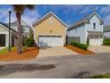 Detached two car garage, with a manicured lawn, in a neighborhood setting at 1243 Appling Dr, Mount Pleasant, SC 29464