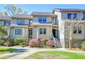 Charming condo exterior with beautiful landscaping and inviting entrance, creating a warm curb appeal at 165 River Breeze Dr, Charleston, SC 29407