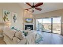 Bright and airy living room with vaulted ceilings, fireplace, and marsh views, perfect for relaxing at 165 River Breeze Dr, Charleston, SC 29407