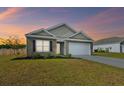 Beautiful brick home with manicured lawn and inviting curb appeal at 369 Spruce Ivy St, Moncks Corner, SC 29461