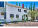 Charming two-story home with black shutters and lush landscaping at 95 Ashley Ave # D, Charleston, SC 29401
