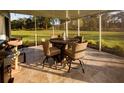 Relaxing screened-in patio for outdoor dining at 10032 Randall, McClellanville, SC 29458