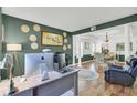 Office features decorative wall hangings, hardwood floors, and white-columned archway at 123 Dasharon Ln, Goose Creek, SC 29445