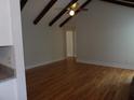 Inviting living room with vaulted ceilings and exposed wooden beams at 136 Tall Pines Rd, Ladson, SC 29456