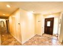 Inviting entryway with tile floors and natural light creates a warm and welcoming ambiance at 307 Fairington Dr, Summerville, SC 29485