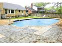 Private in-ground pool with patio offers a refreshing backyard oasis for summer fun and relaxation at 307 Fairington Dr, Summerville, SC 29485