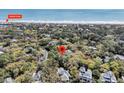 Aerial view showcases the property's location near Beach Club and the ocean at 410 Ocean Oaks Ct, Kiawah Island, SC 29455