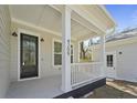 Charming front porch showcasing white columns and the house number at 4209 Royal Harbor Rd, Hollywood, SC 29449