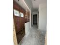 Hallway with views into rooms under construction, highlighting future layout and design potential at 625 Marsh Cove Cir, Summerville, SC 29486