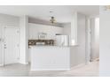 Bright, modern kitchen with white cabinets, stainless steel appliances, and stylish backsplash at 712 Bent Hickory Rd, Charleston, SC 29414