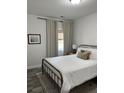 Cozy bedroom featuring neutral tones, a comfortable bed, and stylish decor at 928 Sycamore Ave, Charleston, SC 29407