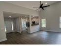 Spacious living room with an open concept layout and high ceilings at 222 New Iris Ln, Ridgeville, SC 29472