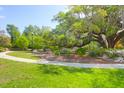 Beautiful community grounds with mature trees and walking paths, ideal for outdoor activities at 2221 Chatelain Way, Mount Pleasant, SC 29464