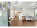 Bright entryway featuring hardwood floors, modern lighting, and stylish decor at 227 Oak View Way, Summerville, SC 29483