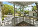 View from the covered porch showcasing the neighborhood street and inviting atmosphere at 63 Guerry Cir, Goose Creek, SC 29445