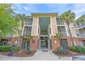 Welcoming building entrance featuring brick accents, a compass design, and easy access at 1022 Basildon Rd, Mount Pleasant, SC 29466
