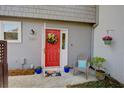 A colorful front door with a vibrant wreath, cheerful decor, and welcoming number 1307 at 1307 Ventura Pl, Mount Pleasant, SC 29464