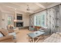 Cozy living room featuring a fireplace, neutral tones, and comfortable seating at 14 Royal Beach Dr, Kiawah Island, SC 29455