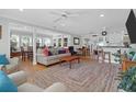 Spacious living room with hardwood floors, bright light, and neutral colors perfect for entertaining and Gathering life at 17 24Th Ave, Isle of Palms, SC 29451