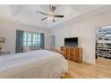 Spacious primary bedroom featuring a tray ceiling, ceiling fan, and neutral paint at 777 Hamlet Cir, Goose Creek, SC 29445