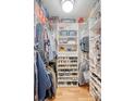 Organized walk-in closet with custom shelving and hanging racks for ample storage at 777 Hamlet Cir, Goose Creek, SC 29445