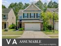 Home with brick and siding exterior, two-car garage and inviting curb appeal at 134 Longford Dr, Summerville, SC 29483