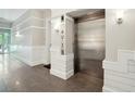 Hallway with elevator providing convenient access to upper floors, as well as a smooth and easy move-in process at 155 Wingo Way # 433, Mount Pleasant, SC 29464