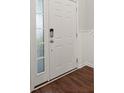 Entryway featuring decorative sidelight window and hardwood flooring at 169 Longford Dr, Summerville, SC 29483