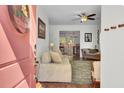 Inviting living room with hardwood floors, comfortable seating, and an open layout to the dining area at 1954 Treebark Dr, Charleston, SC 29414