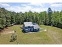 Aerial view of home surrounded by lush greenery at 2102 Williams Rd, Ruffin, SC 29475